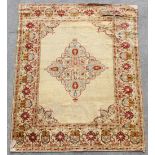 Property of a lady - an antique Turkish Kayseri silk rug, damages, 62 by 46ins. (158 by 117cms.).