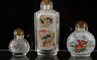Property of a deceased estate - three Chinese inside painted glass snuff bottles, two of slightly