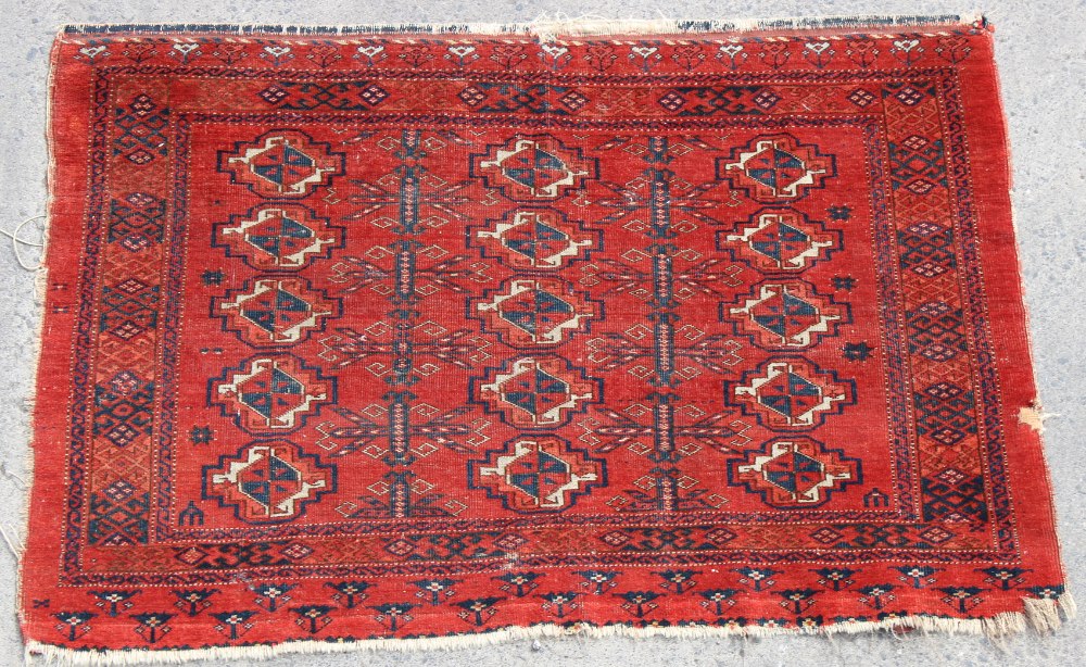 Property of a deceased estate - an early 20th century Turkoman juval, 51 by 36ins. (130 by 91cms.).