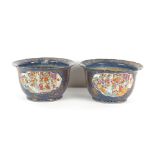 Property of a lady - a pair of 19th century Chinese blue & gilt ground planters or jardinieres, both