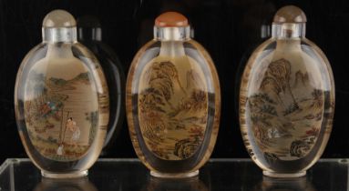 Property of a deceased estate - three large Chinese inside painted glass snuff bottles, each of
