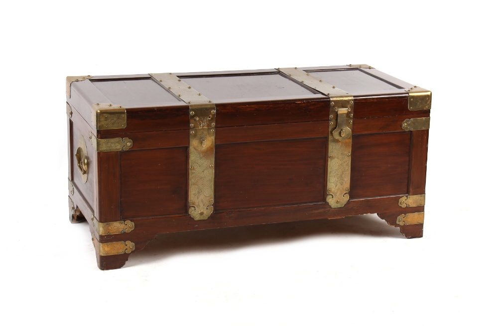 Property of a gentleman - a Chinese camphorwood & brassbound trunk, mid 20th century, with