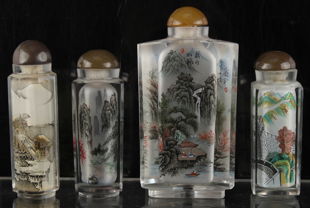 Property of a deceased estate - four Chinese inside painted glass snuff bottles, one of triangular