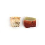 Property of a lady - two small Chinese jade toggles, Ming Dynasty of earlier, the mutton fat example