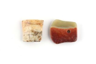 Property of a lady - two small Chinese jade toggles, Ming Dynasty of earlier, the mutton fat example