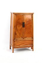 Property of a lady - a small Chinese softwood two-door cupboard, late 19th / early 20th century,