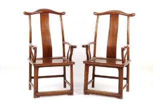 A pair of Chinese jumu yoke back armchairs (2).