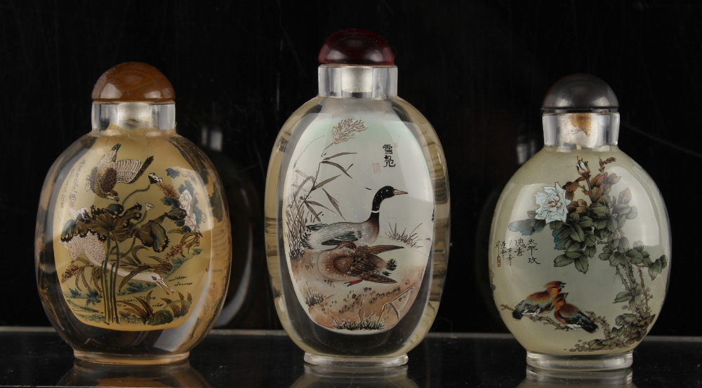 Property of a deceased estate - three Chinese inside painted glass snuff bottles, each of slightly