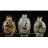 Property of a deceased estate - three Chinese inside painted glass snuff bottles, each of slightly