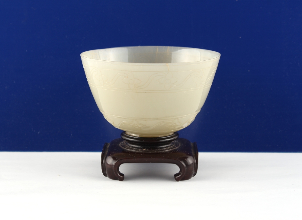 Property of a gentleman - a Chinese carved pale celadon or whitish jade footed bowl, 20th century, - Image 2 of 4