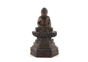 Property of a gentleman of title - a small bronze Buddha, probably late 19th century, presently