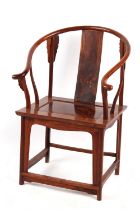 Property of a gentleman - a Chinese huanghuali horseshoe back armchair, quanyi, 20th century.