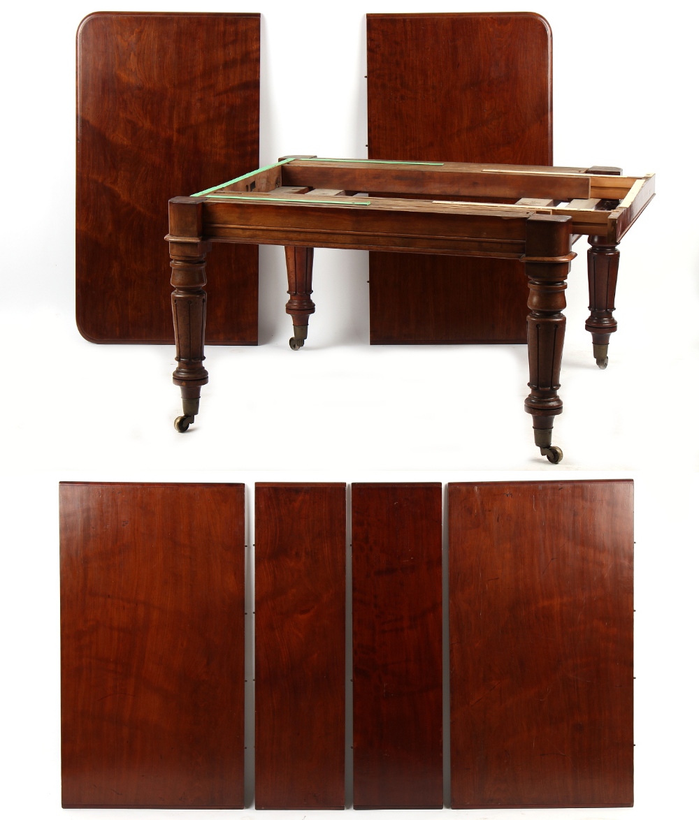 Property of a gentleman - a mid Victorian mahogany telescopic extending dining table with four extra