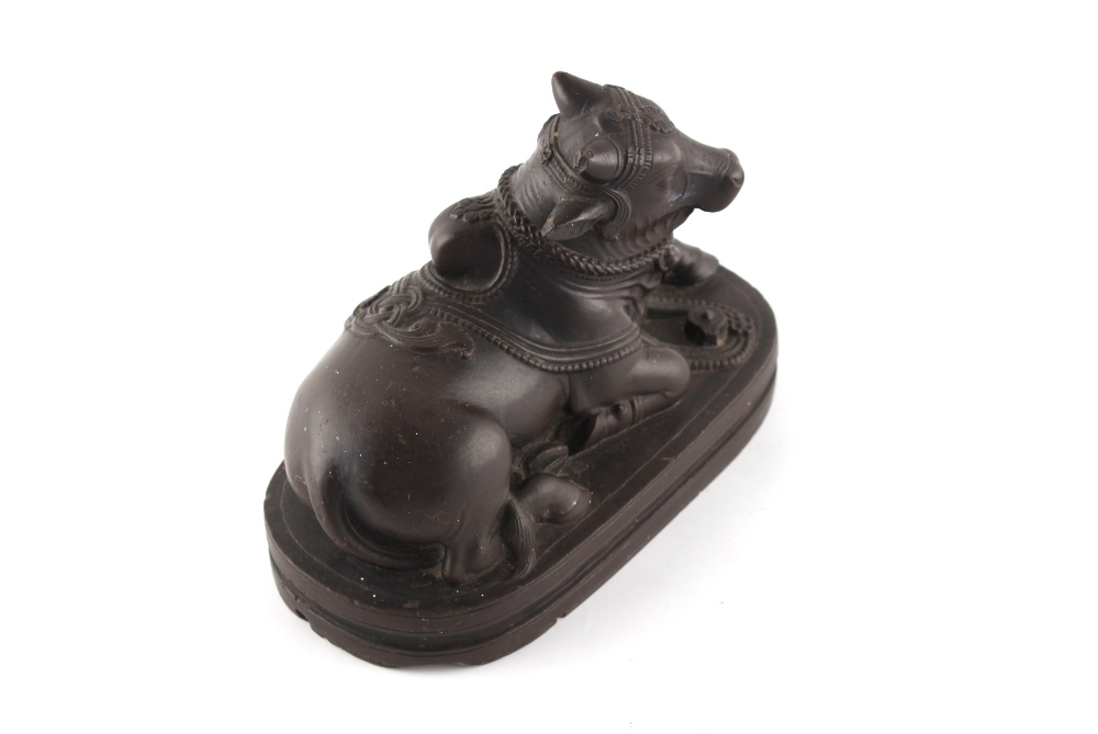 Property of a lady - an Indian carved black stone model of a Nandi Bull, losses, 5.85ins. (14.8cms.) - Image 3 of 4