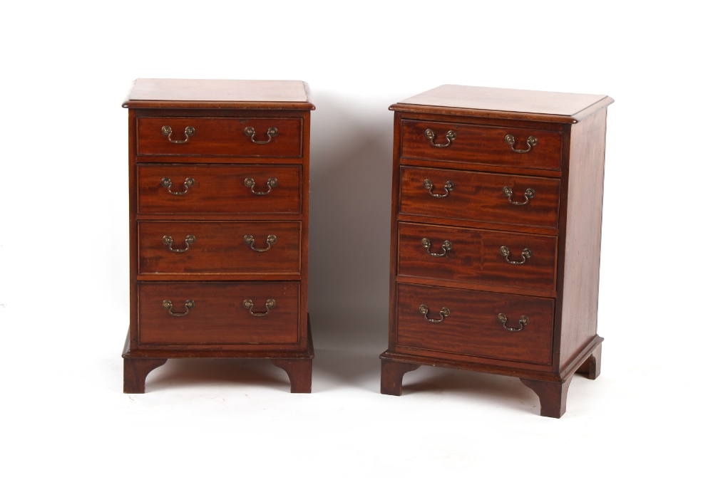 Property of a gentleman - a small pair of mahogany chests of drawers, parts 19th century, each