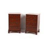 Property of a gentleman - a small pair of mahogany chests of drawers, parts 19th century, each