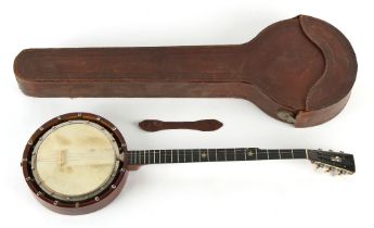 Property of a deceased estate - a banjo, small chips to wood ring & 3 strings missing, in leather