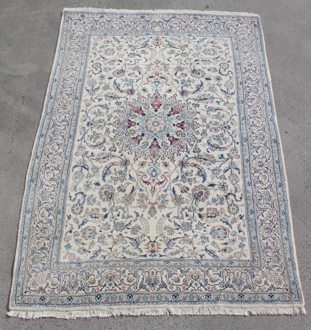 Property of a deceased estate - a Persian Isfahan carpet, with ivory ground, 115 by 77ins. (292 by