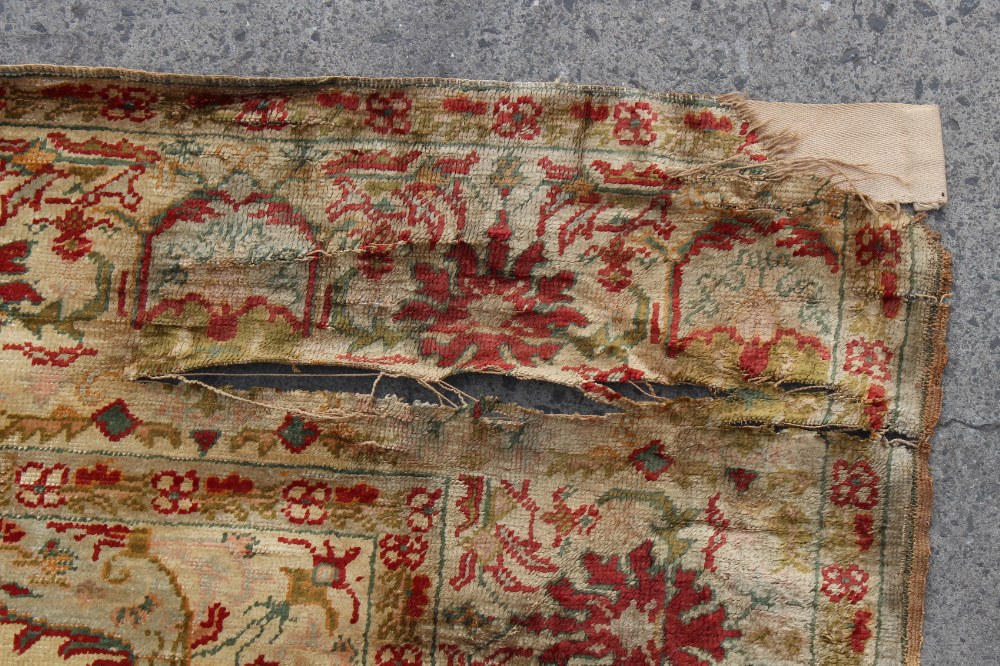 Property of a lady - an antique Turkish Kayseri silk rug, damages, 62 by 46ins. (158 by 117cms.). - Image 2 of 2