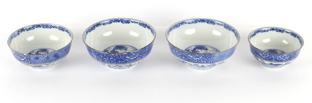 Property of a gentleman - a set of four early 20th century Japanese blue & white porcelain bowls,
