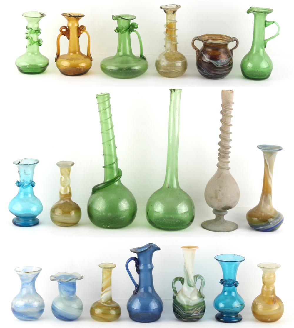 Property of a lady - a collection of nineteen Middle Eastern, probably Persian, glass vases & ewers,