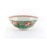 Property of a lady - a 19th century Chinese iron red & green lotus bowl, the inside centre painted