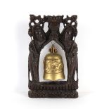 Property of a gentleman - an early 20th century Chinese bronze bell on carved hardwood & silver wire