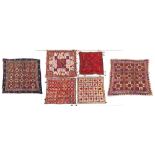 Property of a lady - a group of six Indian or Pakistani embroidered panels, four with mirror