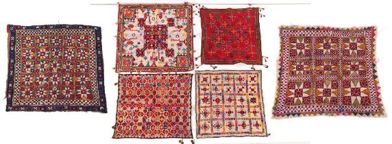 Property of a lady - a group of six Indian or Pakistani embroidered panels, four with mirror