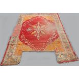 Property of a lady of title - an antique Turkish Ushak or Oushak carpet, two sections missing, other