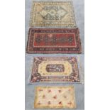 Property of a lady - four assorted rugs including a kelim, 88 by 61ins. (234 by 155cms.) (4).