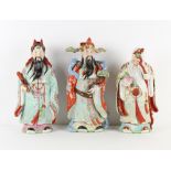 Property of a gentleman - a set of three large Chinese porcelain figures of Immortals, modern, the