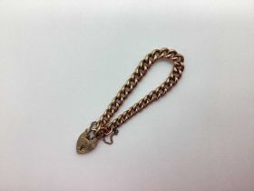 A 9ct Rose Gold Graduated Curb Link Bracelet, to heart shape padlock style clasp, stamped "9ct" (