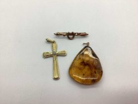 A Victorian Horseshoe Bar Brooch, together with a cross pendant and a further statement drop