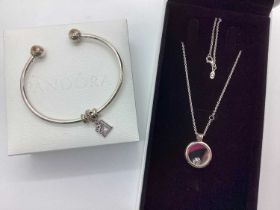 Pandora; A Modern 'Floating Locket' Necklace, with enamel ladybug charm, together with a Pandora