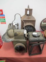 Four Railway Lights/Lamps, in poor condition, comprising a signal light (heavy corrosion), a railway
