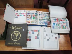Stamps; A collection of world stamps housed in five junior albums, plus one empty album.