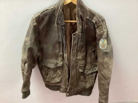 A United States Air Force Mid XX Century Brown Leather Jacket, possibly Korean theatre of war, one