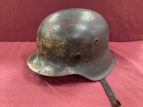 WW2 German Army M42 steel helmet with liner and split leather chin strap, marks on interior of