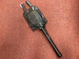 WW1 German entrenching tool with manufacturer mark and date 1915, complete with leather tool head