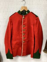 British Army Green Howards dress jacket with regimental lapel badges (bottom of jacket has been