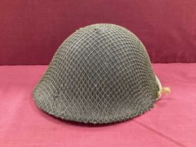 WW2 Army steel 'turtle' Mk 3 combat helmet with liner (stamped 1945), chin strap and net cover.