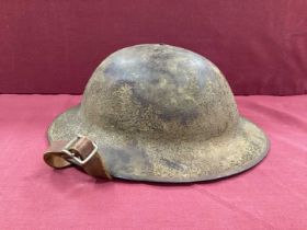 WW1 British Army Brodie Mk I steel helmet with part liner and leather chin strap marks on the