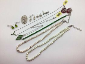 A Collection of Modern Costume Jewellery, including a claw set line bracelet, of uniform design,