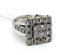 A Large Diamond Set Square Panel Ring, set throughout with graduated brilliant cut stones ,