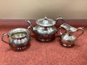 An EPBM Three Piece Tea Set, each with floral engraved decoration and bead and reel edge. (3)