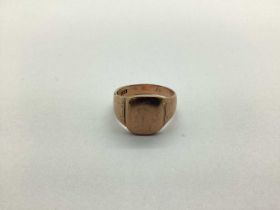 A Signet Style Ring, stamped "9ct"(?) worn (finger size U) (6.6grams).