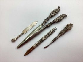 A Hallmarked Silver Page Marker, glove stretchers (damages); pencil, etc. (4)