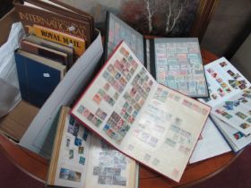 Stamps; A collection of world stamps, early to modern, housed in three albums and eight