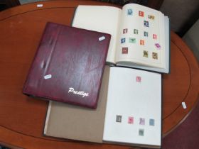Stamps; World stamp collection, early to modern, housed in two loose leaf albums, plus an empty '